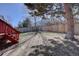 Spacious backyard featuring privacy fence and mature trees at 9659 Autumnwood Pl, Highlands Ranch, CO 80129