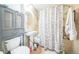 Classic bathroom featuring a shower-tub combo and a mirrored vanity at 3656 W 77Th Ave, Westminster, CO 80030