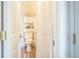 Cozy bathroom features white toilet, decorative shelving, and a charming shower curtain at 3656 W 77Th Ave, Westminster, CO 80030
