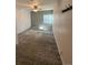 Bedroom showcasing a modern fan, window, and contemporary carpet at 3656 W 77Th Ave, Westminster, CO 80030