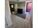 Entryway with tiled floor and dark furniture for a modern look at 3656 W 77Th Ave, Westminster, CO 80030