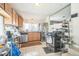 Well-equipped kitchen featuring stainless steel appliances and ample counter space at 3656 W 77Th Ave, Westminster, CO 80030