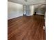 Open living room featuring hardwood floors and neutral walls at 3656 W 77Th Ave, Westminster, CO 80030