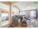Comfortable living room featuring hardwood floors and an open layout to the kitchen at 3656 W 77Th Ave, Westminster, CO 80030