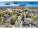 Aerial view of a house in a residential area close to parks, a school, and recreational facilities at 17595 E Wesley Pl, Aurora, CO 80013