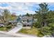 Aerial shot of a two-story home, displaying its curb appeal and surrounding neighborhood at 17595 E Wesley Pl, Aurora, CO 80013