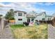 Backyard with a patio, play set, well-maintained lawn, and wood privacy fence at 17595 E Wesley Pl, Aurora, CO 80013