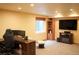 Bonus room featuring a media center, desk, and a window with natural light at 17595 E Wesley Pl, Aurora, CO 80013