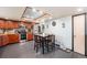 Well-lit kitchen with stainless steel appliances, wood cabinets, and neutral wall paint at 17595 E Wesley Pl, Aurora, CO 80013
