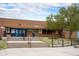 Vassar Elementary School entrance features a classic brick facade with accessibility features and mature landscaping at 17595 E Wesley Pl, Aurora, CO 80013