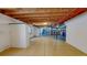 Spacious unfinished basement with window and ample space for storage or future customization at 1936 E 144Th Dr, Thornton, CO 80602