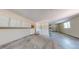 Spacious two-car garage with built-in storage cabinets, offering organized space at 1936 E 144Th Dr, Thornton, CO 80602