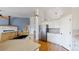 Beautiful kitchen with stainless steel appliances, tiled backsplash, and ample counter space at 1936 E 144Th Dr, Thornton, CO 80602