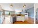 Beautiful kitchen with stainless steel appliances and open to the living room at 1936 E 144Th Dr, Thornton, CO 80602