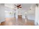 Open-concept living area with hardwood floors and a seamless flow for entertaining at 1936 E 144Th Dr, Thornton, CO 80602