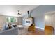 Comfortable living room with a modern fireplace and vaulted ceilings at 1936 E 144Th Dr, Thornton, CO 80602