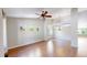 Spacious living room featuring hardwood floors and plenty of natural light at 1936 E 144Th Dr, Thornton, CO 80602