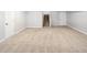 Spacious finished basement with neutral carpet, light gray walls, and white trim at 10511 Jaguar Gln, Lone Tree, CO 80124