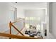 Bright living room with tall ceilings, light grey couches, and lots of windows at 10511 Jaguar Gln, Lone Tree, CO 80124