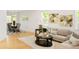 Bright living room with hardwood floors, neutral-toned sofas, stylish decor, and open dining area at 10511 Jaguar Gln, Lone Tree, CO 80124