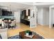 Beautiful open floor plan connecting the kitchen, dining area, and living room, great for entertaining at 10511 Jaguar Gln, Lone Tree, CO 80124