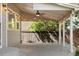 Covered patio with ceiling fan, lights, and concrete flooring at 10511 Jaguar Gln, Lone Tree, CO 80124