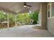 Covered patio with ceiling fan and concrete flooring at 10511 Jaguar Gln, Lone Tree, CO 80124