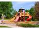 A well-maintained playground is nestled within a community park at 10511 Jaguar Gln, Lone Tree, CO 80124