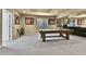 Spacious basement with plush carpeting, pool table, and sports memorabilia, perfect for entertaining at 2885 W 115Th Dr, Denver, CO 80234