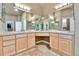 Bathroom featuring a double vanity with updated fixtures, and lots of natural light at 2885 W 115Th Dr, Denver, CO 80234