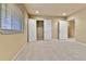 Bedroom with carpet, closet doors and window providing natural light at 2885 W 115Th Dr, Denver, CO 80234