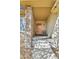 Inviting front porch with stone accents and well-maintained entryway at 2885 W 115Th Dr, Denver, CO 80234