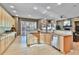Bright and airy kitchen featuring stainless steel appliances, light wood cabinets, and hardwood floors at 2885 W 115Th Dr, Denver, CO 80234