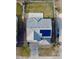 Aerial view of a home featuring solar panels, a yard, and a driveway at 14873 E 119Th Ave, Commerce City, CO 80603