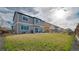 Fenced backyard with a patio area, ideal for relaxation and gatherings at 14873 E 119Th Ave, Commerce City, CO 80603