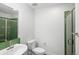 Modern bathroom featuring a glass-enclosed shower, sleek vanity, and contemporary fixtures at 2900 Inca St # 7, Denver, CO 80202