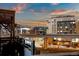 Rooftop deck with nighttime cityscape views, showing city lights and the vibrant urban environment at 2900 Inca St # 7, Denver, CO 80202