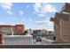 Rooftop deck with panoramic views of the cityscape and the buildings in the distance at 2900 Inca St # 7, Denver, CO 80202