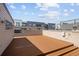 Spacious rooftop deck offering ample space for entertaining with views of the surrounding neighborhood at 2900 Inca St # 7, Denver, CO 80202