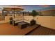 Inviting rooftop deck with comfortable outdoor seating and a shaded umbrella at 2900 Inca St # 7, Denver, CO 80202