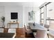 Dining area is bright and modern with large windows and contemporary decor at 2900 Inca St # 7, Denver, CO 80202