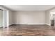Open living room with hardwood floors and lots of natural light at 14050 E Linvale Pl # 309, Aurora, CO 80014