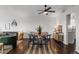 Cozy dining area with elegant hardwood floors and modern decor, perfect for Gathering gatherings and entertaining at 3738 Black Feather Trl, Castle Rock, CO 80104
