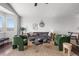 Bright and spacious living room featuring modern furniture, stylish decor, and ample seating for relaxation at 3738 Black Feather Trl, Castle Rock, CO 80104