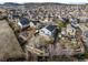 Aerial view of a home with a deck and fenced yard in a vibrant, Gathering-friendly community at 3738 Black Feather Trl, Castle Rock, CO 80104