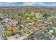 The neighborhood is viewed from above highlighting nearby parks and a community area at 701 Emporia St, Aurora, CO 80010