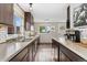 Modern kitchen with stainless steel appliances, custom cabinets, and ample counter space for food preparation at 701 Emporia St, Aurora, CO 80010