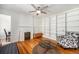 Bright living room features built-in bookshelves, a decorative fireplace, and hardwood floors at 1137 N Sherman St # 16, Denver, CO 80203
