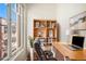 Bright office space features a large window and desk with hard wood floors; perfect for working from home at 1137 N Sherman St # 16, Denver, CO 80203