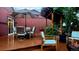 Inviting back deck featuring patio seating, pergola, and a cozy outdoor fire pit at 17372 E Prentice Cir, Centennial, CO 80015
